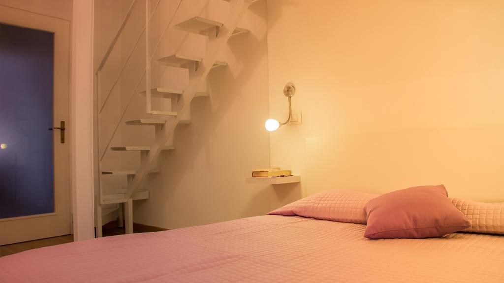 Appartamento Lilla Dei Buoni E Cattivi กาญารี ห้อง รูปภาพ